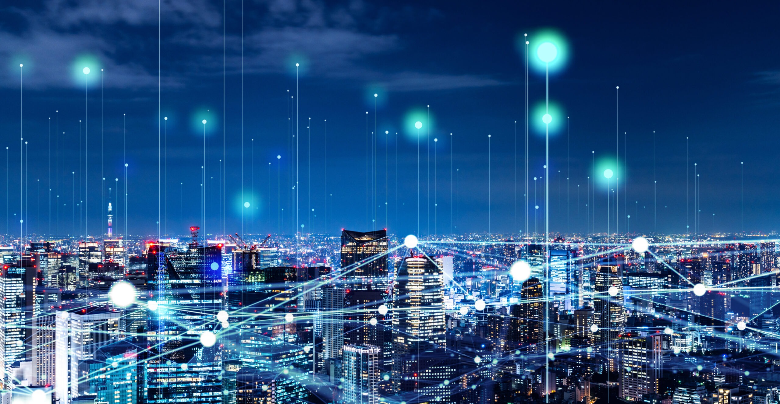 A vibrant city skyline at night, overlaid with digital connectivity lines